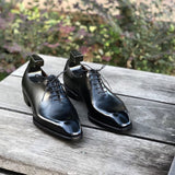 Black Leather Pamira Whole Cut Oxfords