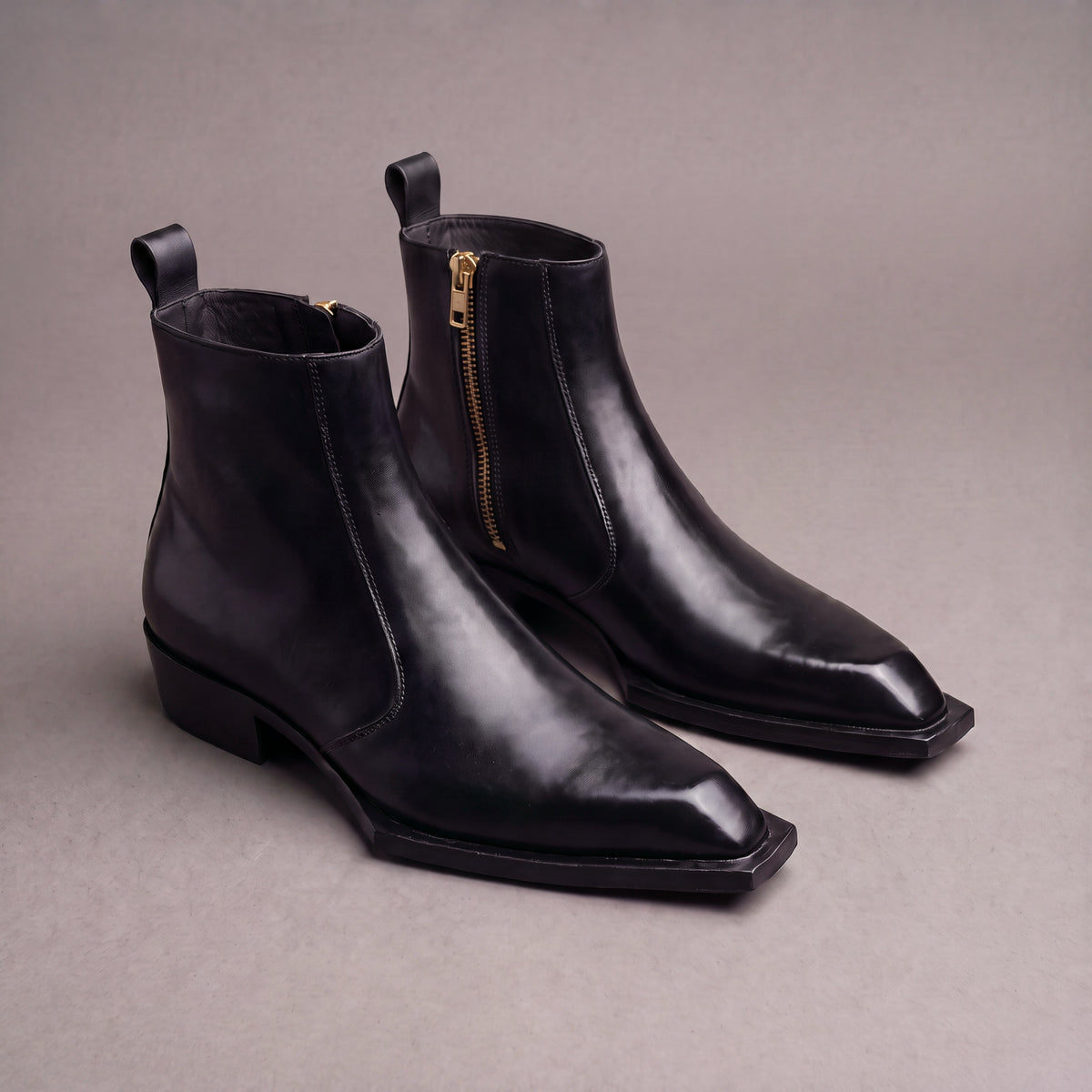 Black leather Levante chisel toe zipper boots, pair